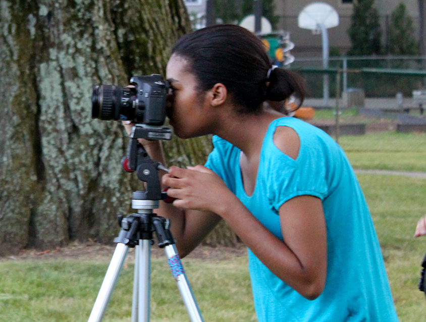 Teen Image child taking a photo
