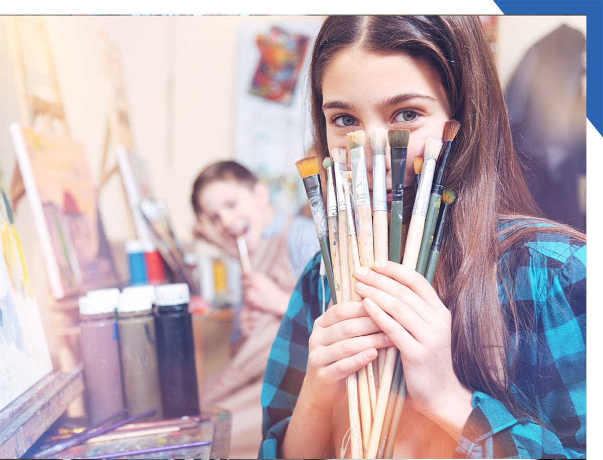 Children with painting supplies