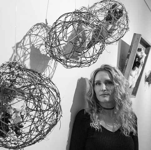 Gianakis posed in front of her work.
