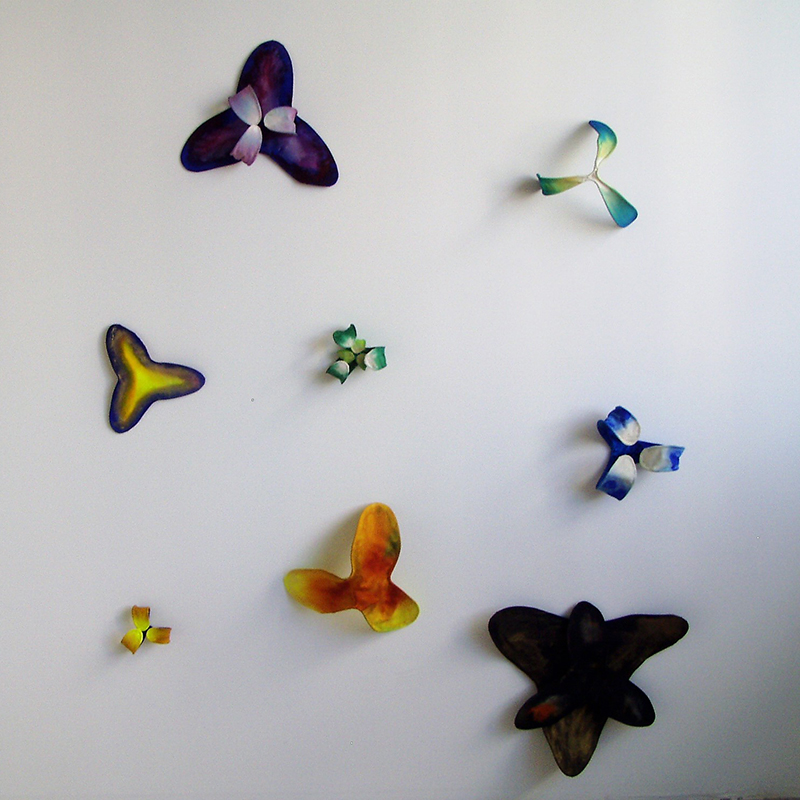 Brooklyn based artist Rhia Hurt composes installations with organically-shaped stretched canvases. Each canvas is configured into an individual form and painted with washes of color. In this site-specific installation, Hurt responds to the architecture in the Art Center’s Main Stairwell.