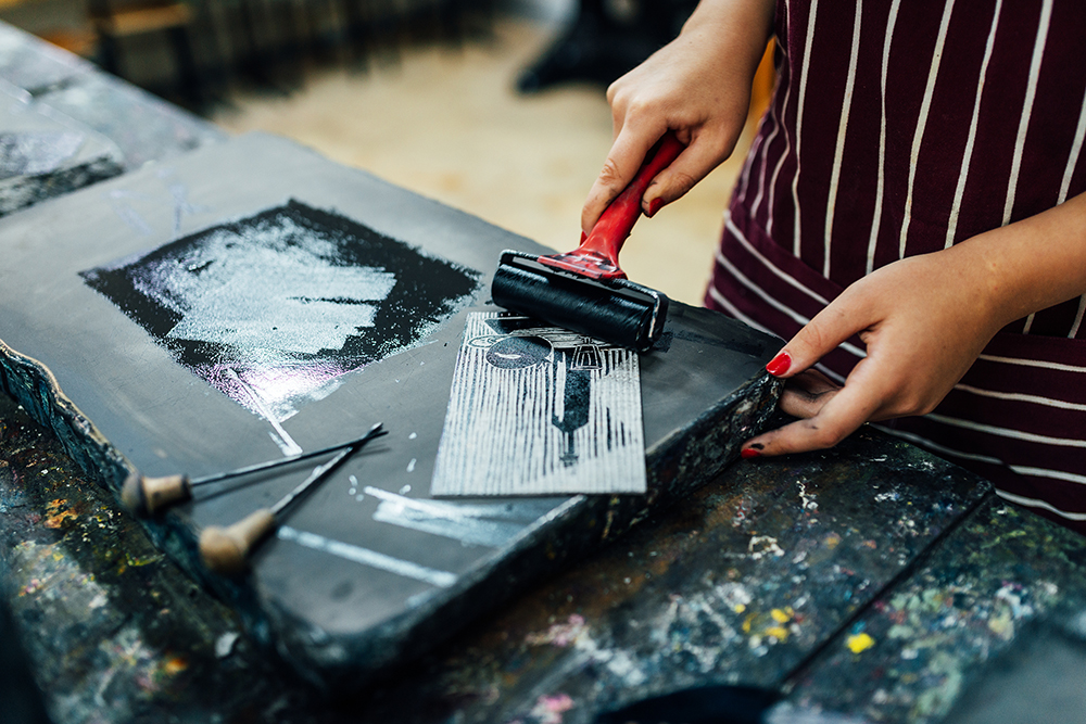 Artist making a print