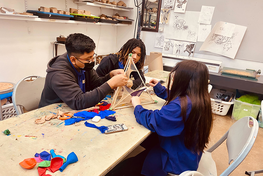 Students from the Jefferson Arts Academy working on an art project.