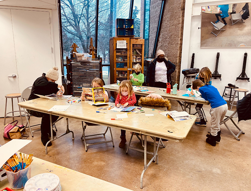Community members create thank you cards during MLK Day.