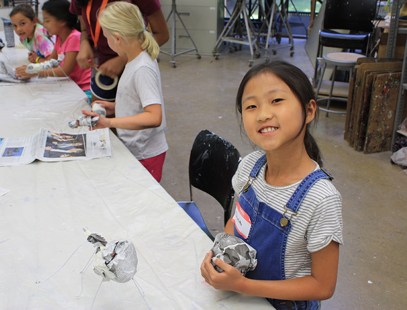 Kid at summer art camp.