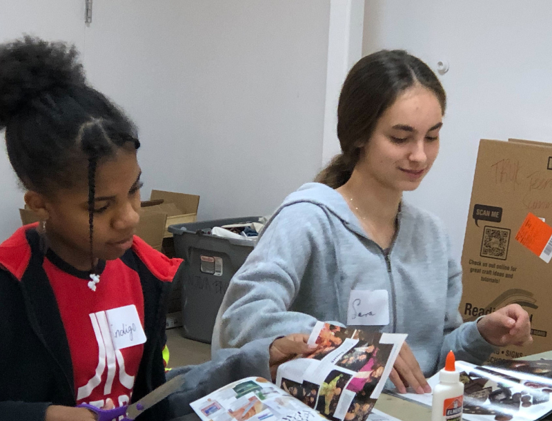 Teen artists working on a collage project.
